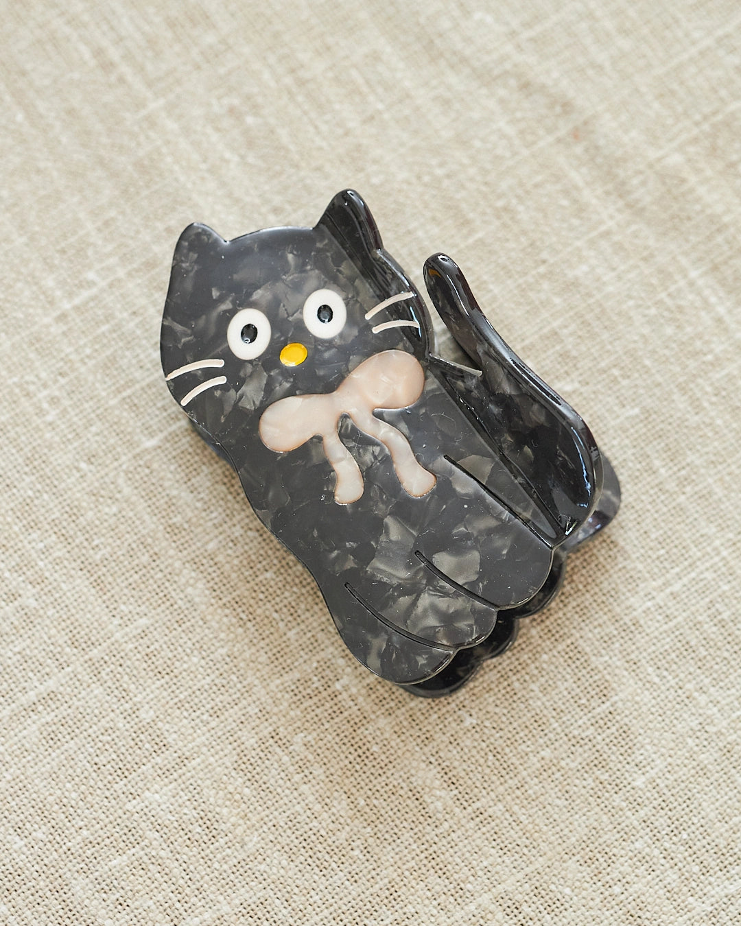 pince cheveux chat noir